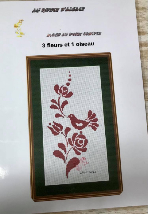 3 fleurs et 1 oiseau